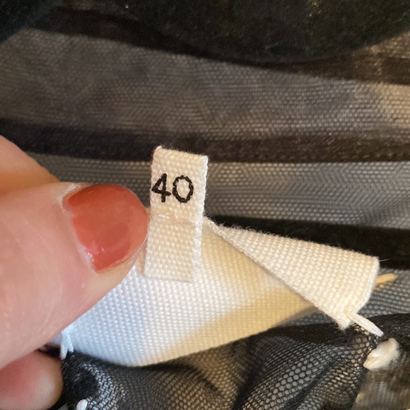 Writing in back says “things you can’t believe” - Picture 4 of 4